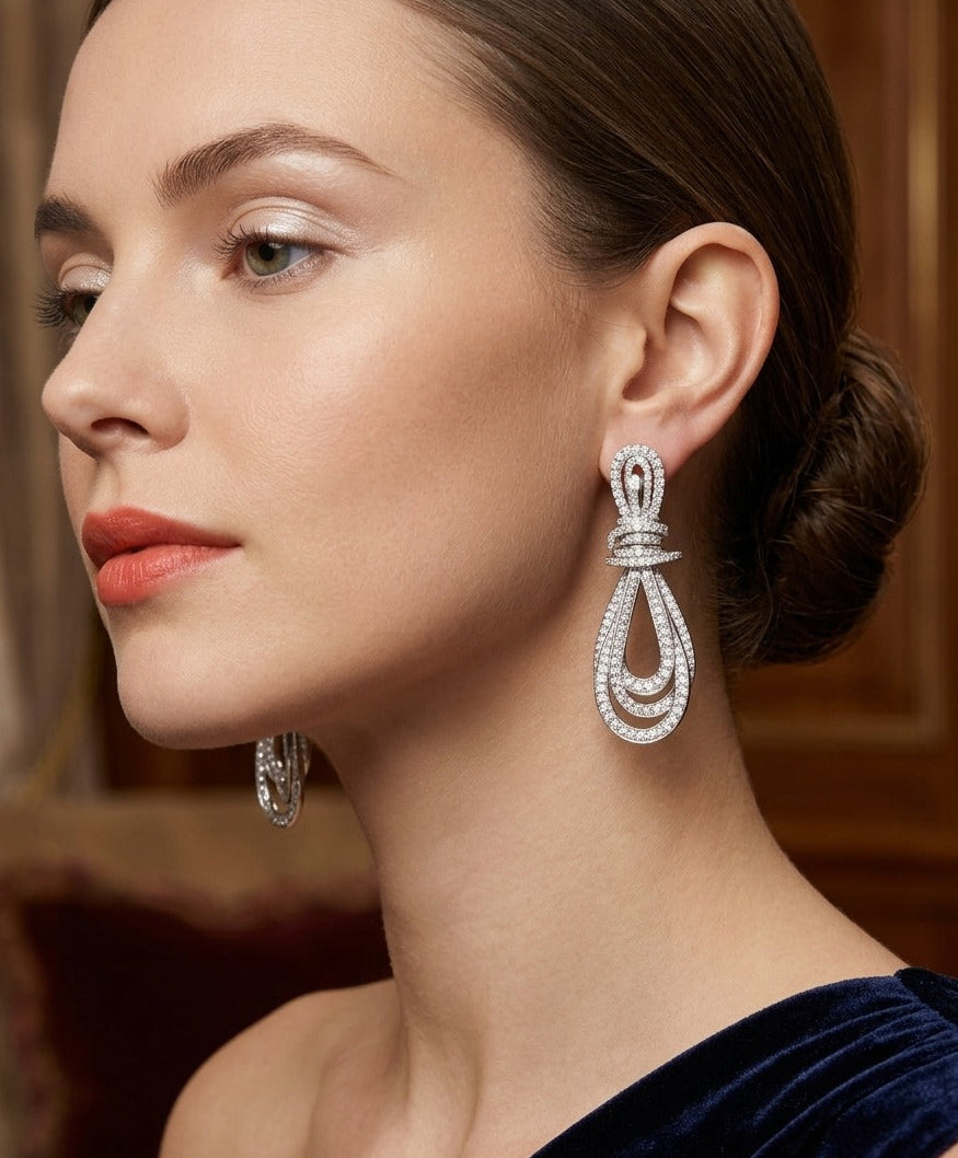 Woman wearing elegant earrings with a blurred background