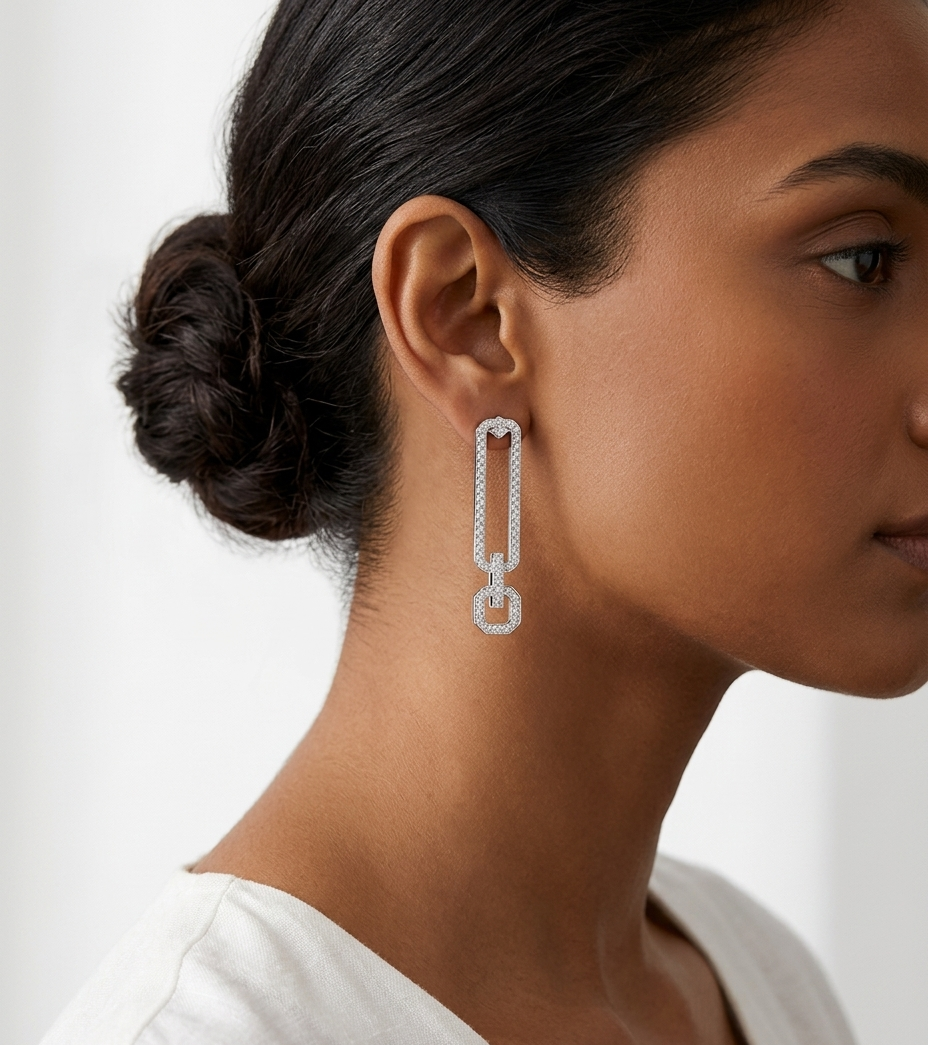 Earring worn by a person with a neutral background